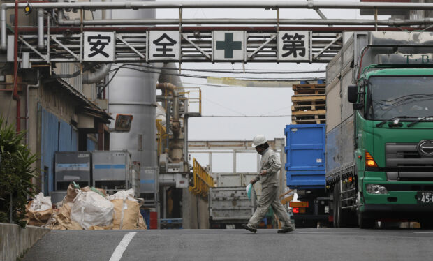 Japan's Feb factory activity extends decline as conditions worsen