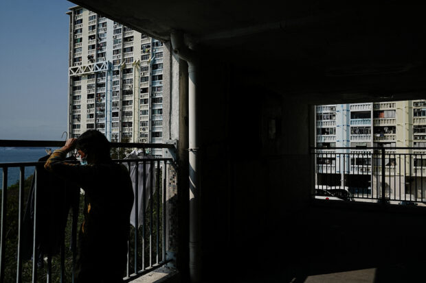 HK under pressure to ease property curbs, plug deficit in budget