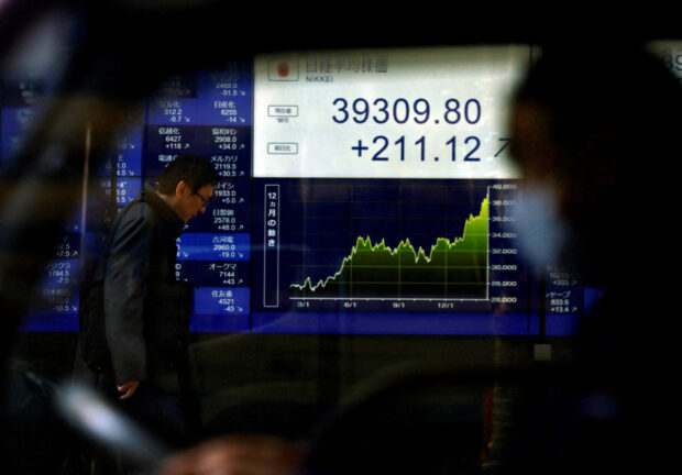 Asian stocks firm before US inflation test; yen gains