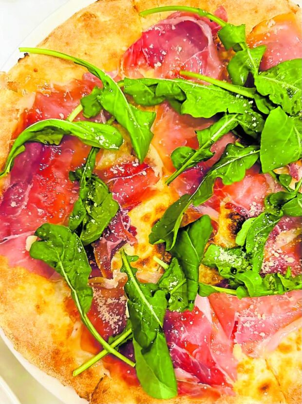 Pizza Amore with prosciutto and arugula