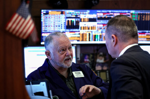 Wall Street rallies, S&P 500 posts record closing high