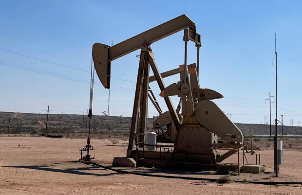 Oil prices extended last week's losses on Monday on concern about slow demand in China, though lingering geopolitical risk surrounding the Middle East and Russia limited the decline.
