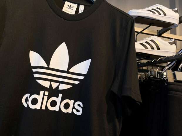 Adidas posts first loss in 30 years but sticks to dividend