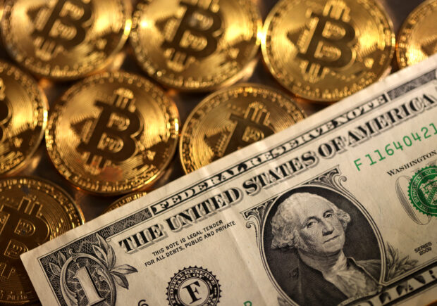 Dollar ticks up before US data, bitcoin hits record high