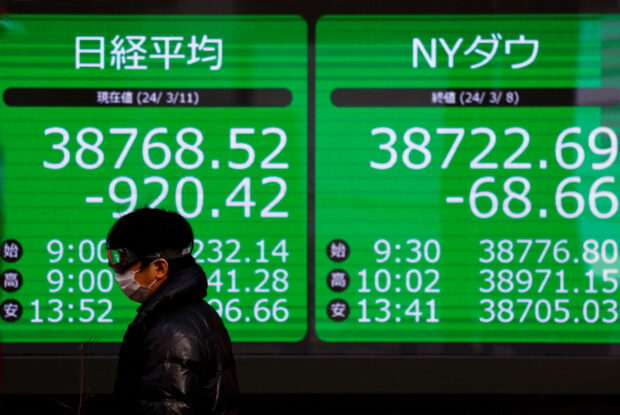 Japan stocks rise, yen slips to 150 after BOJ decision