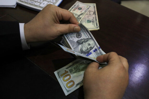 Dollar dips as Asian currencies find support