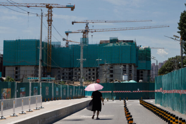 China pushes banks to speed up approvals of loans to developers