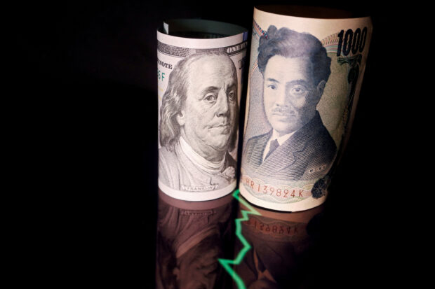 Dollar hits five-month high while jawboning supports yen