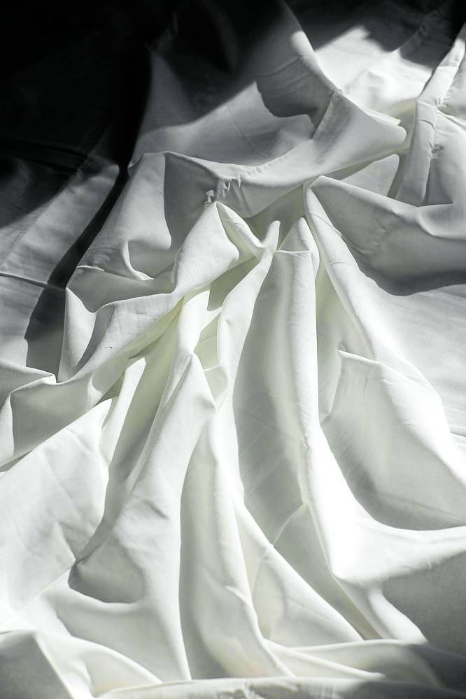 Cooling materials such as cotton allow moisture and air to flow freely through them. 