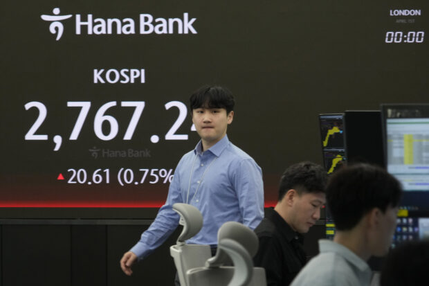Asian shares mixed and Shanghai up on strong China factory data