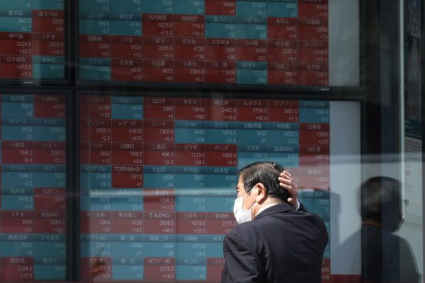Asian shares mostly decline after Wall Street drop on rate cut concerns