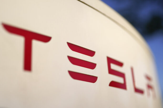 Tesla Q1 profit falls 55%, but stock jumps as firm steps up production