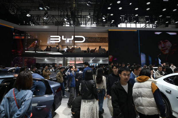 Global car giants seek tech allies in China's cutthroat EV market
