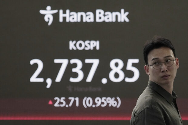 Asian shares trade higher after Wall St rally takes S&P 500 near record