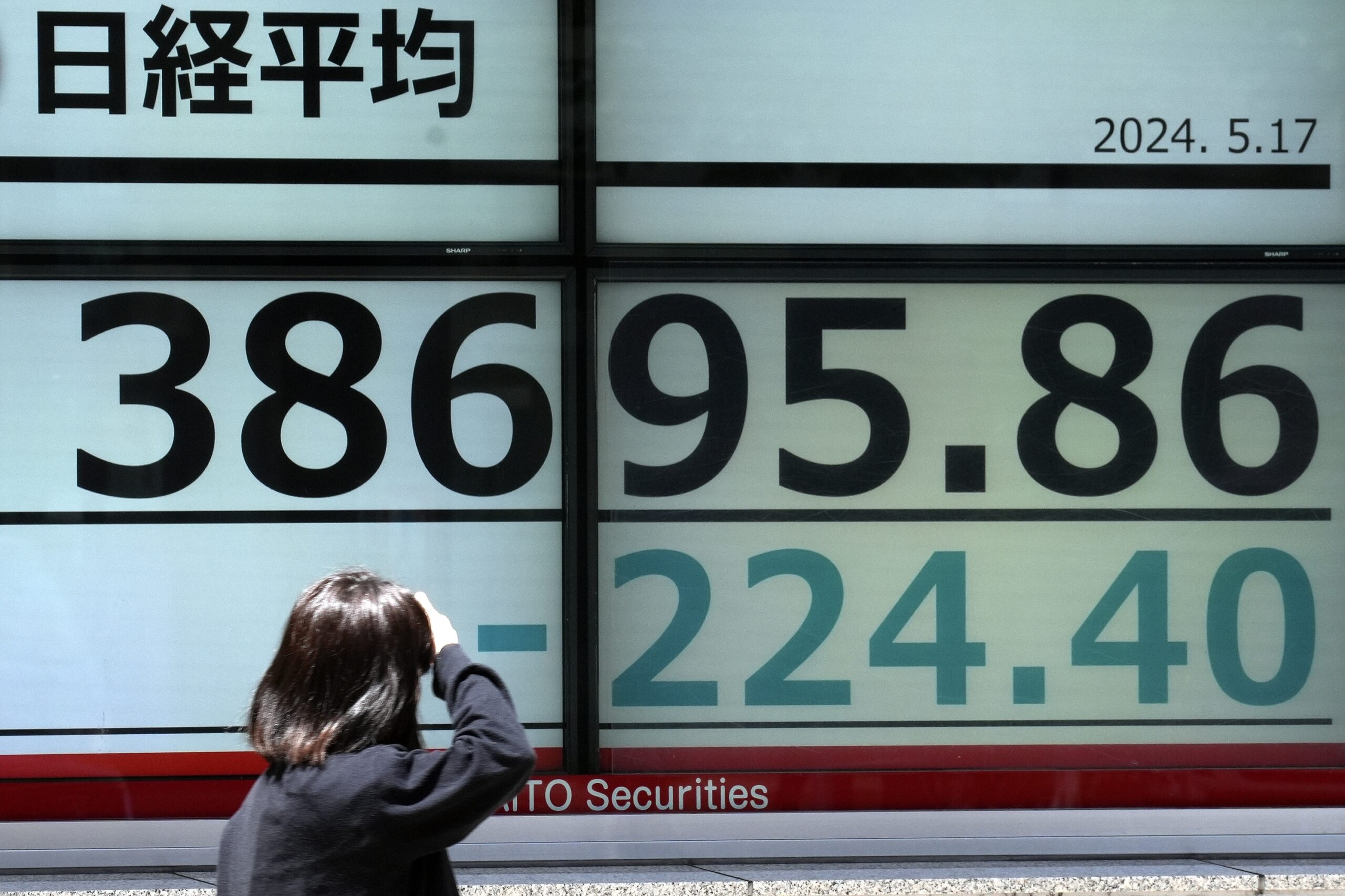 Asian shares mixed as China stocks get bump from new measures