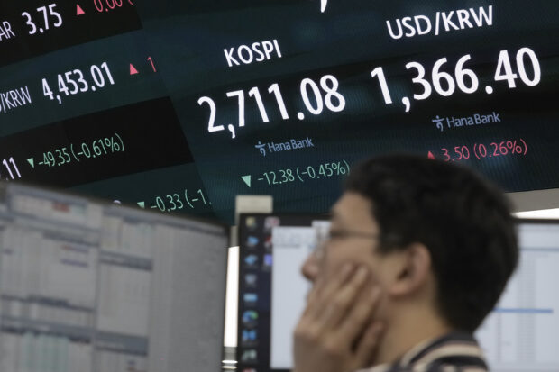 Asian shares mixed, with China stocks down