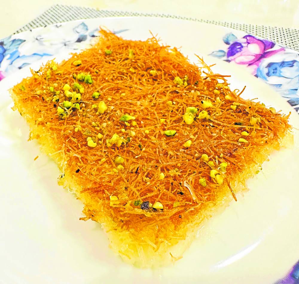 The knafeh is a dessert typically layered with cheese and nuts. 