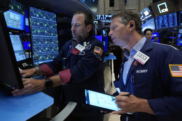 Wall St drifts to mixed finish after latest signal of a slowing economy