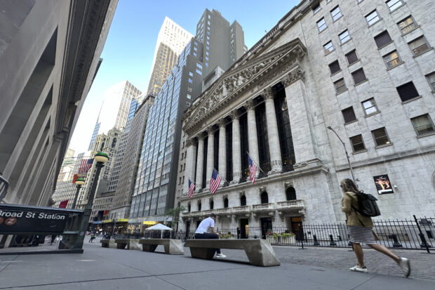 Wall Street drifts to a mixed close but still notches some records