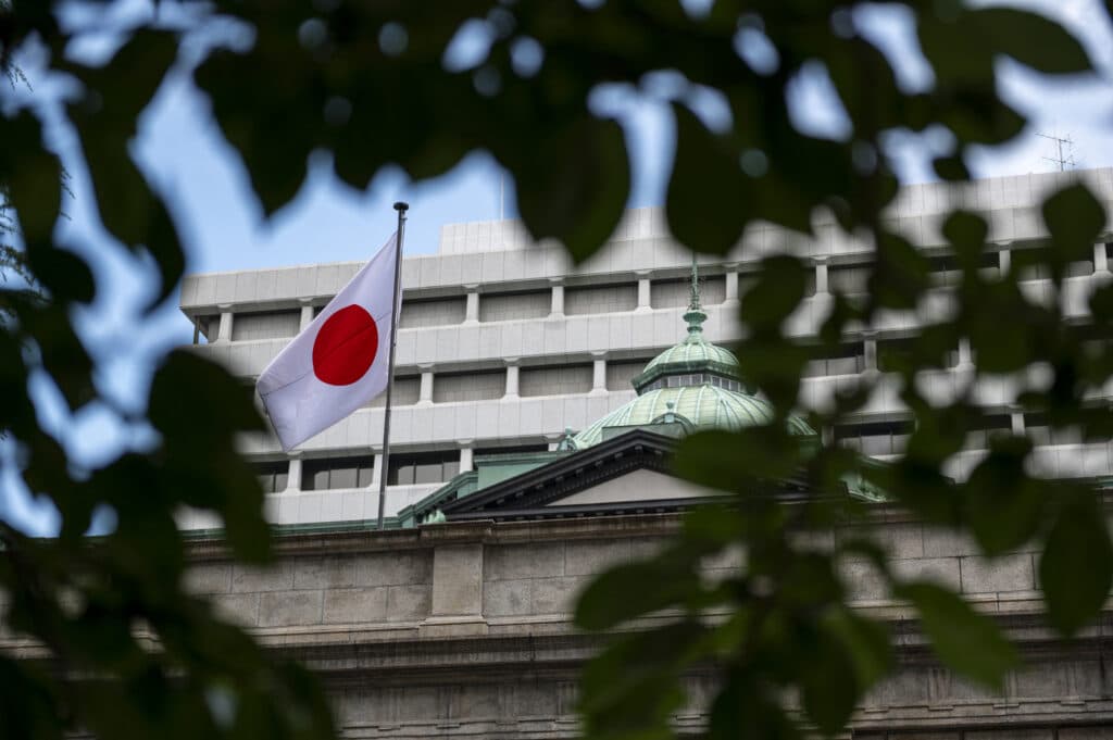 The Japanese national flag is seen at the Bank of Japan (BoJ) headquarters in Tokyo on July 31, 2024. 