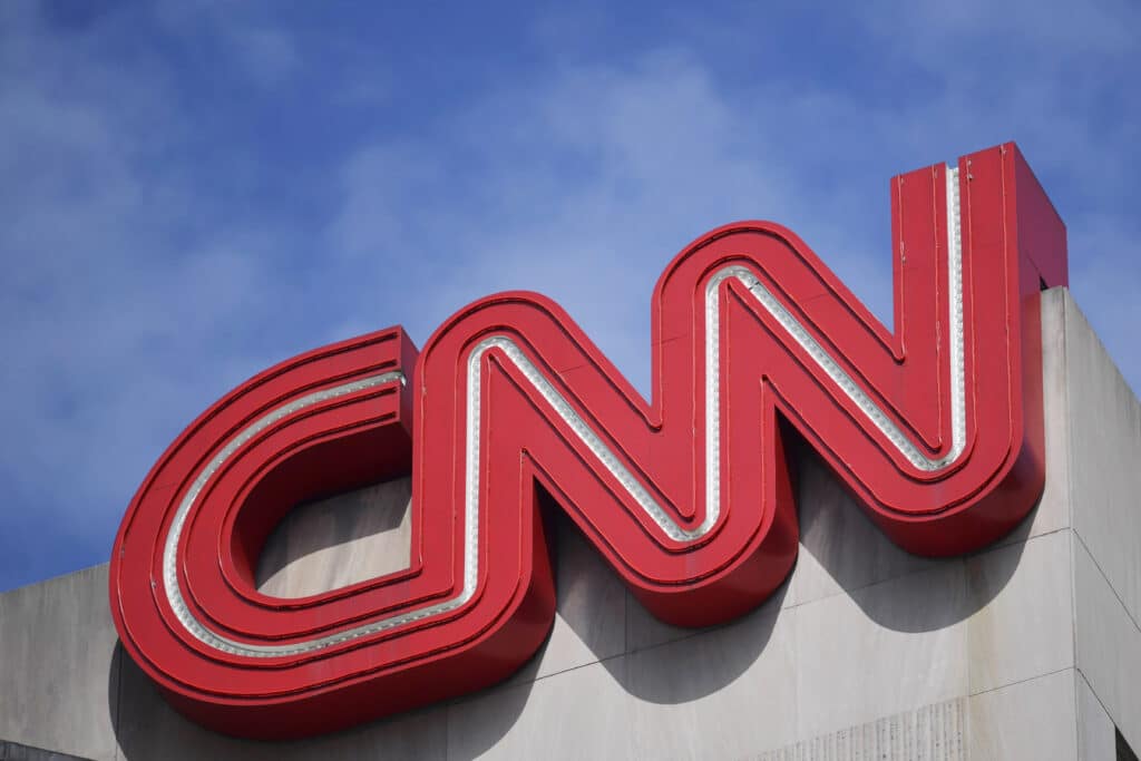 The CNN sign is seen, April 21, 2022, in Atlanta. 