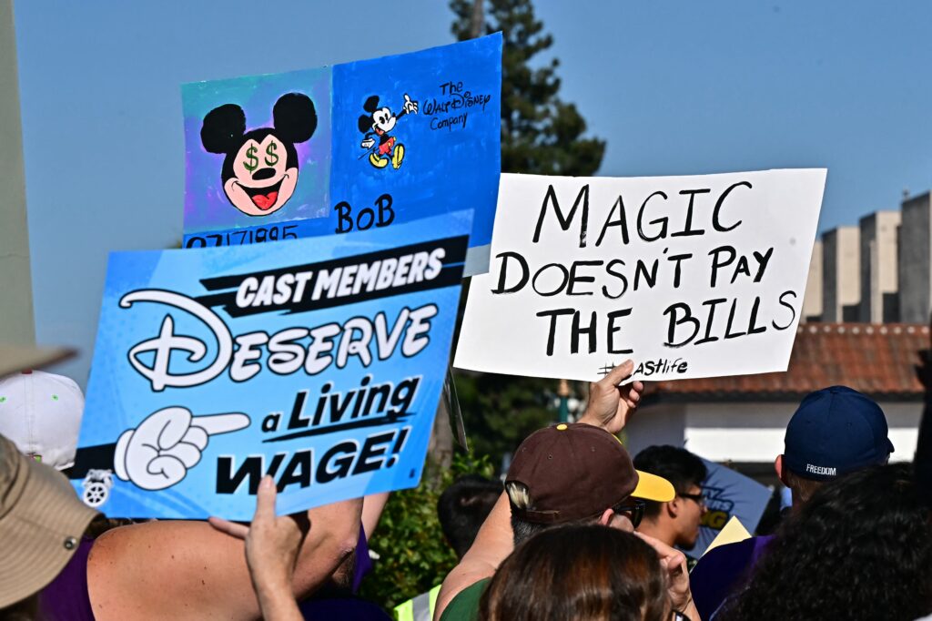 Disney employees rally outside the main entrance of Disneyland Resort in Anaheim, California, on July 17, 2024, ahead of a planned strike authorization vote