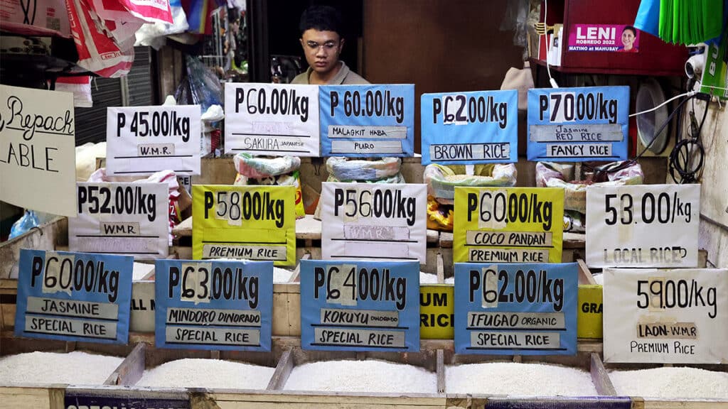 PRICEWATCH Rice prices in this stall at the Marikina City public market on Feb. 15 range from P45 a kilo, the cheapest variety of well-milled rice, to P70 a kilo for the “fancy” red rice. Keeping food, especially rice, affordable to ordinary wage earners is among the major challenges faced by the Marcos administration. —GRIG C. MONTEGRANDE