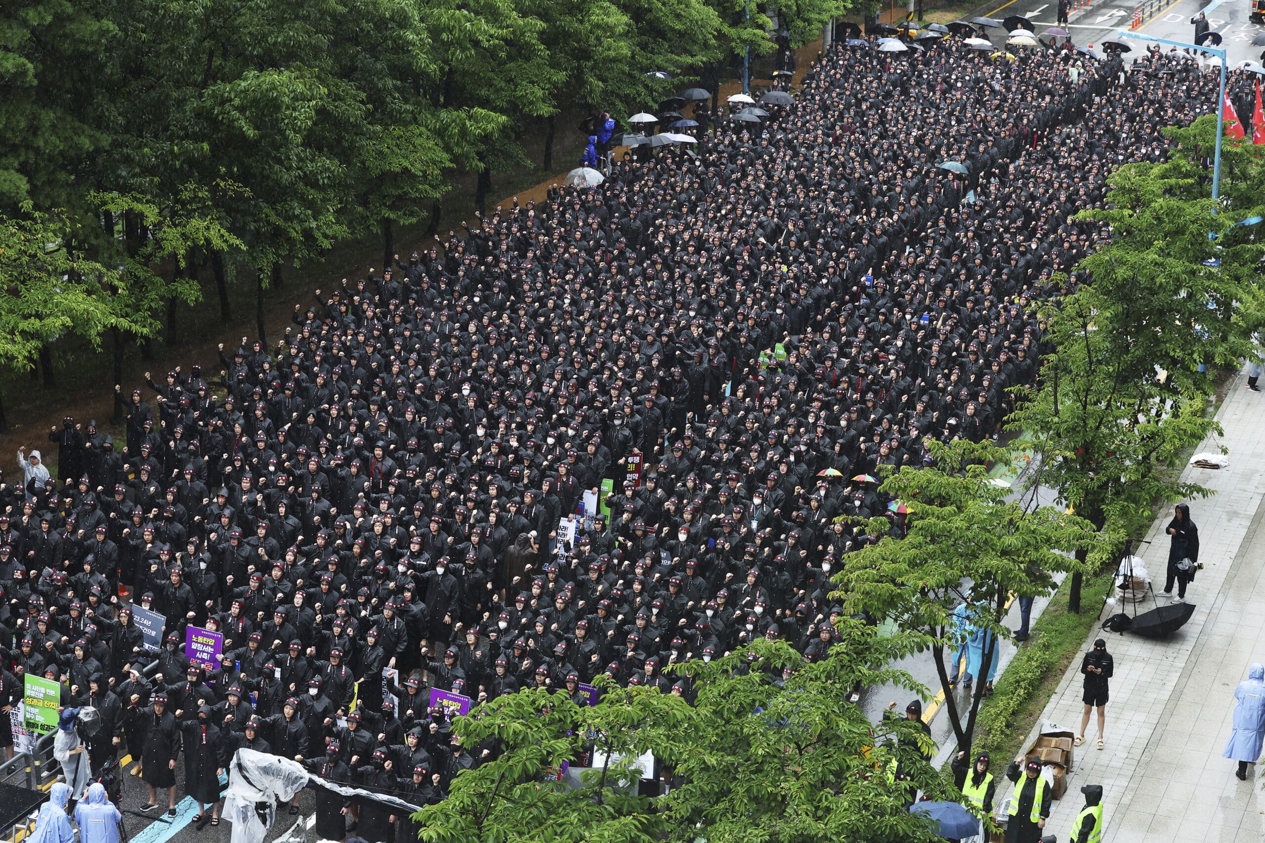 Members of the National Samsung Electronics Union gather during a rally outside of Samsung Electronics' Hwaseong campus in Hwaseong, South Korea, Monday, July 8, 2024.