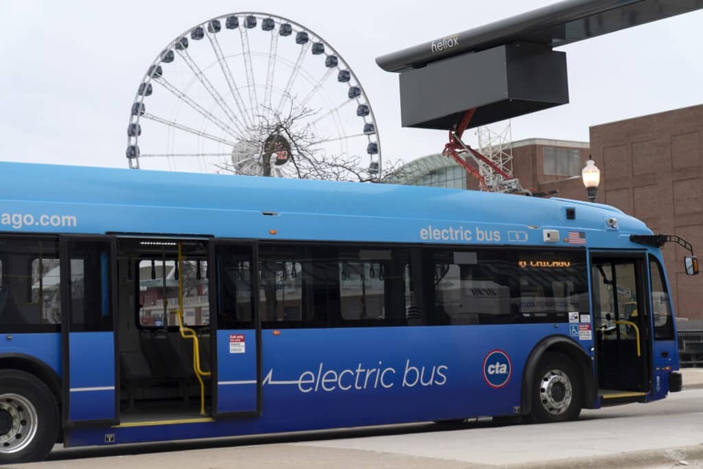 A Chicago Transit Authority electric bus charges at Navy Pier Tuesday, Feb. 14, 2023, in Chicago.