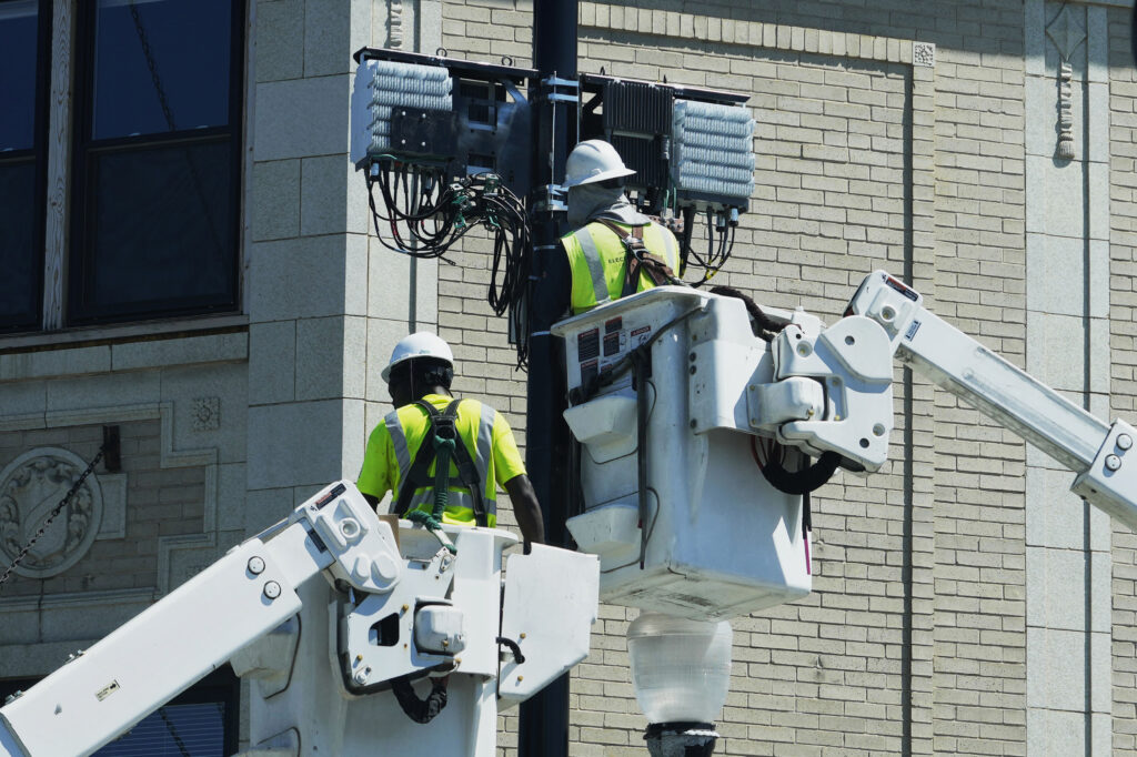 FILE - A utility crew works at a site in Chicago on June 27, 2024. On Tuesday, July 30, 2024, the Labor Department reports on job openings and labor turnover for June. 