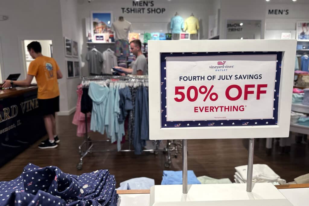 FILE - A holiday sale sign is displayed at a retail store in Rosemont, Ill., June 25, 2024. 