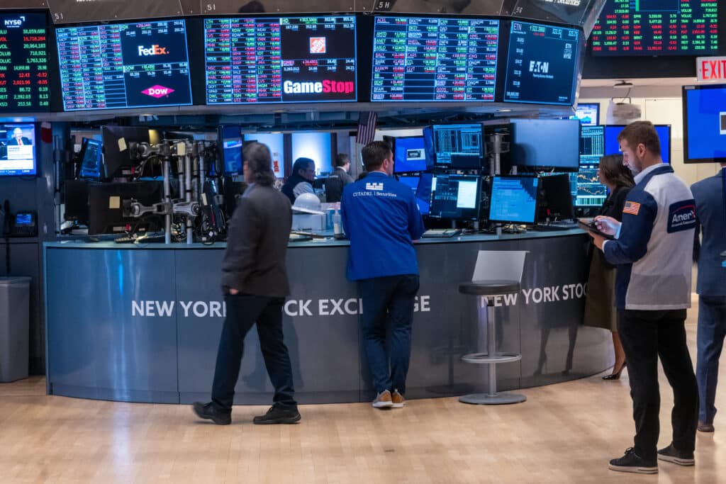 NEW YORK, NEW YORK - JUNE 18: Traders work on the floor of the New York Stock Exchange (NYSE) on June 18, 2024 in New York City. 