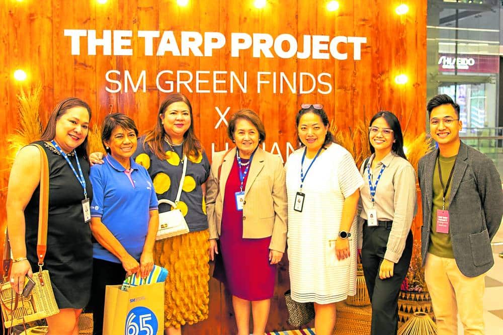 Zarah Juan (third fromleft) with fellowadvocates for the environment at the launch of The Tarp Project.