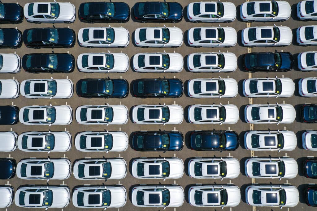 This aerial photo taken on June 28, 2024 shows newly-produced BMW cars parked at a factory in Shenyang, in China's northeastern Liaoning province.