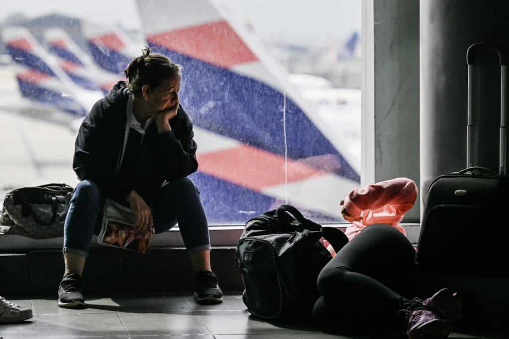 Passengers wait for their flight at the international airport in Bogota on August 26, 2024.