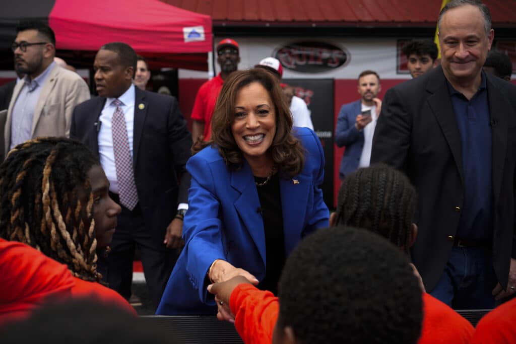 Democratic presidential nominee Vice President Kamala Harris, center, and second gentleman Doug Emhoff