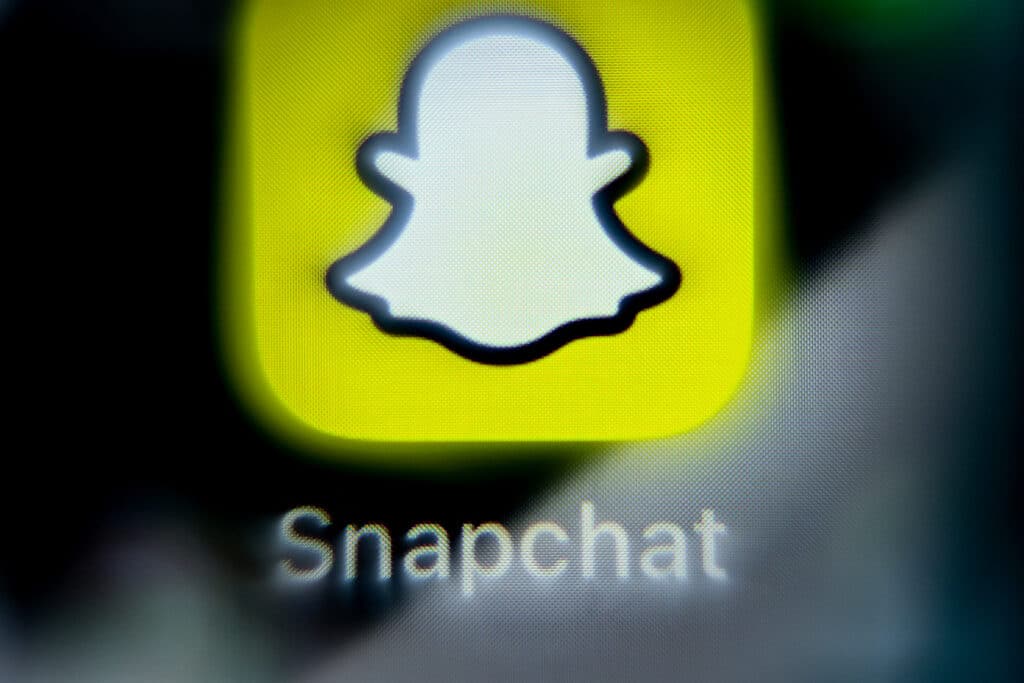 A photo taken on April 3, 2024 shows the logo of US online messenger Snapchat on a smartphone screen in Frankfurt am Main, western Germany. 