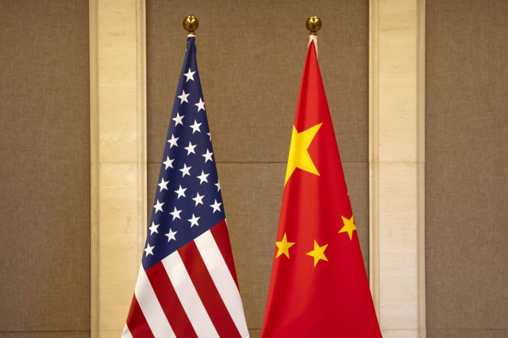 FILE - U.S. and Chinese flags are set up at the Diaoyutai State Guesthouse in Beijing, on July 8, 2023. 