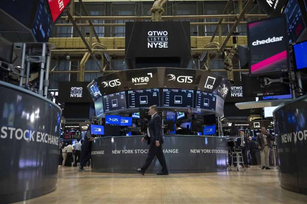 Traders work the floor of the New York Stock Exchange on August 16, 2024.