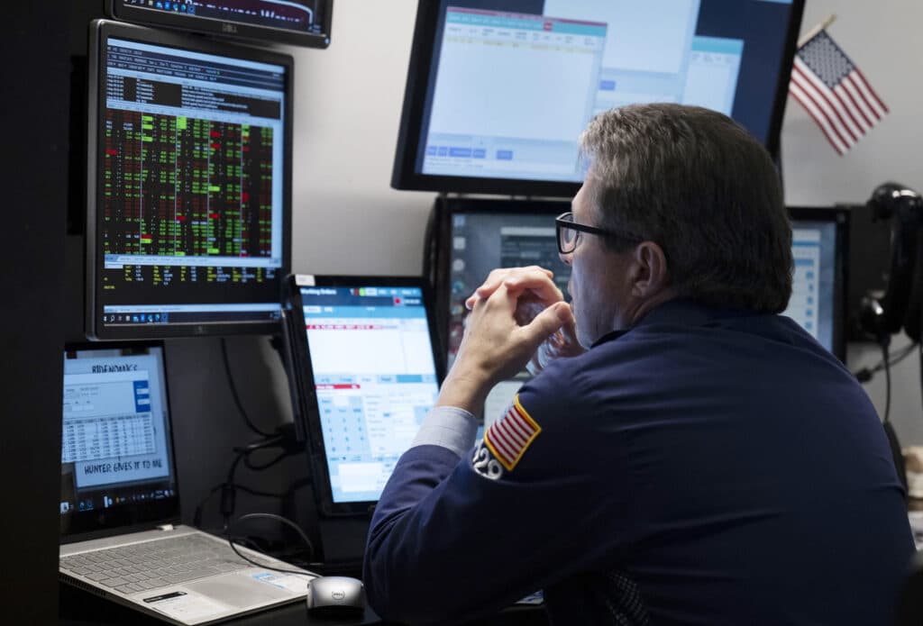 Traders work the floor of the New York Stock Exchange on August 16, 2024.