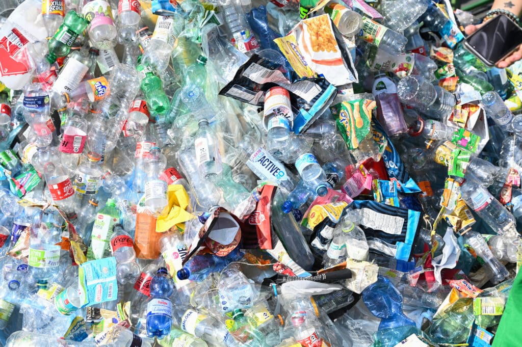 A photograph shows part of Canadian artist and activist Benjamin Von Wong's 5-meter tall art installation the "PerpetualPlastic Machine" during its unveiling ceremony on the banks of the Seine River in Paris on May 27, 2023