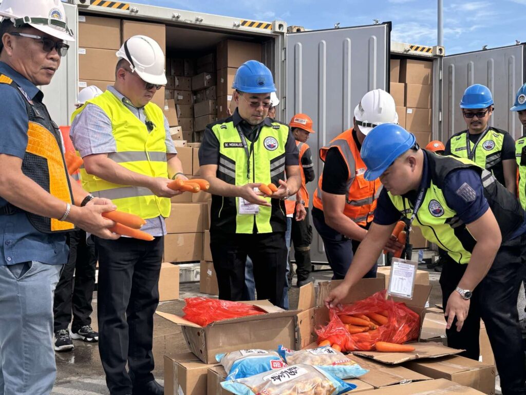 The Department of Agriculture and the Bureau of Customs confiscated on Wednesday P136 million worth of fresh carrots, yellow onions and tobacco products that entered the country illegally.