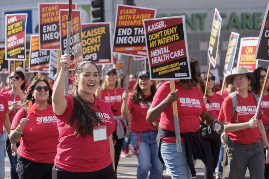 Mental health workers rally outside Kaiser Permanente Los Angeles Medical Center as they begin an open-ended strike in Los Angeles Monday, Oct. 21, 2024.