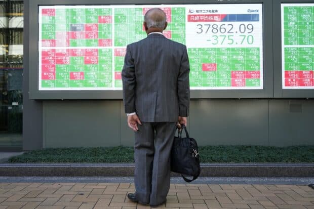 Asian markets are mostly higher as Wall Street is stuck in trade war doldrums