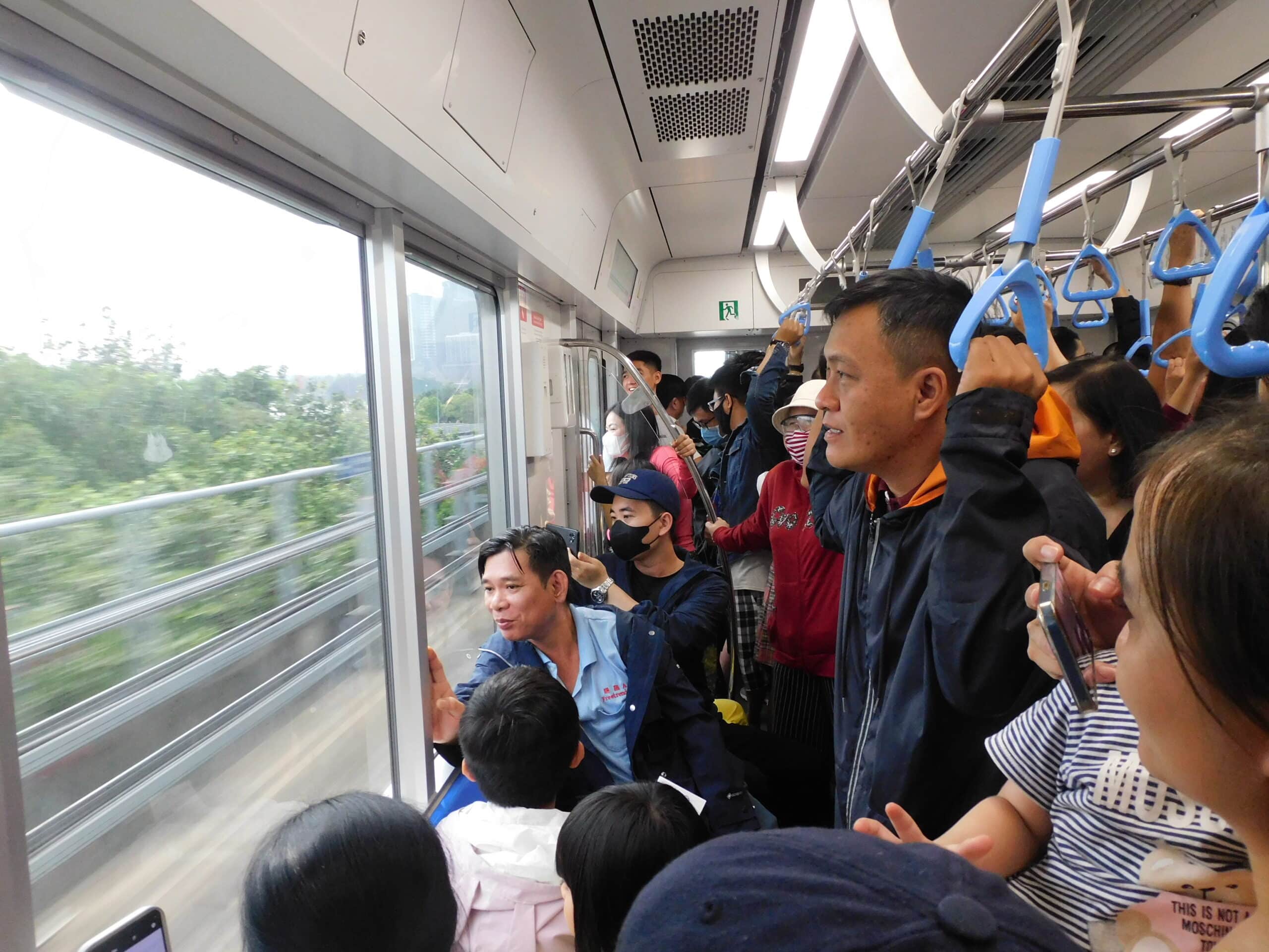 Passengers on a subway in Ho Chi Minh City, Vietnam
