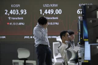 Asian shares sink, with Japan's Nikkei down 5.6 percent as China-US trade war escalates