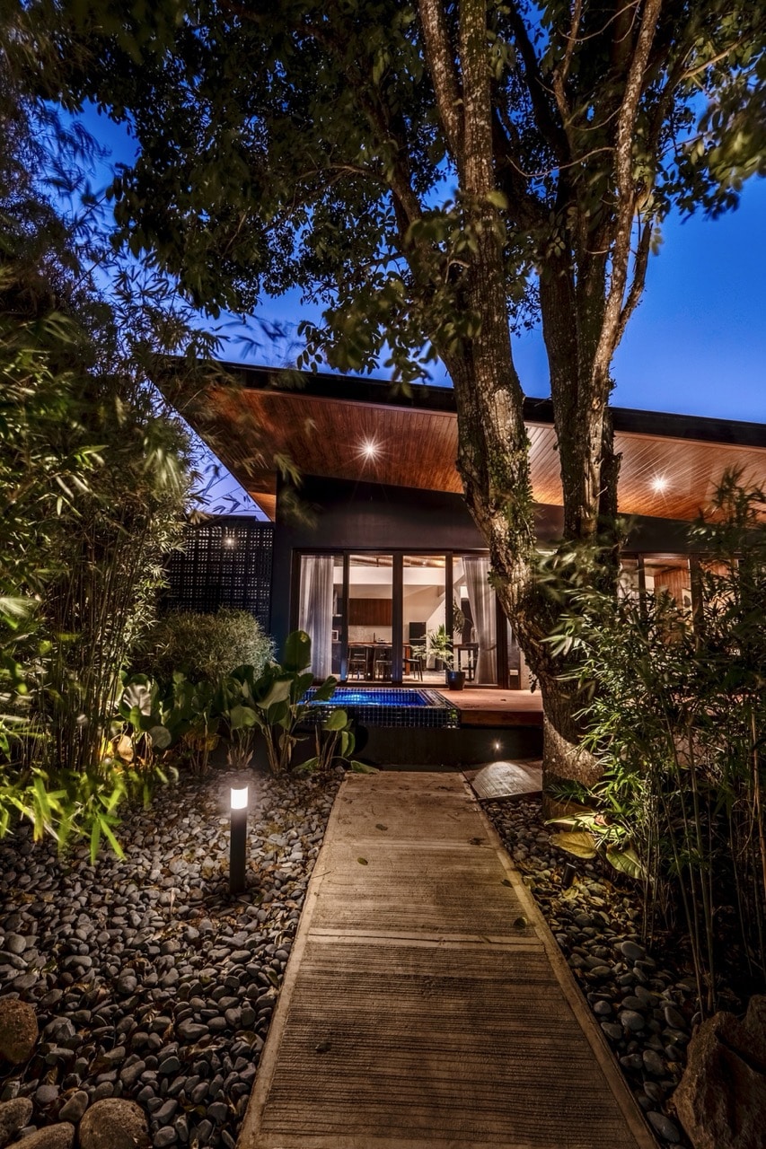Luxury meets sustainability at Ezra Viniti Resort, where cabins feature butterfly roofs that collect graywater for irrigation, blending eco-conscious design with unparalleled comfort.