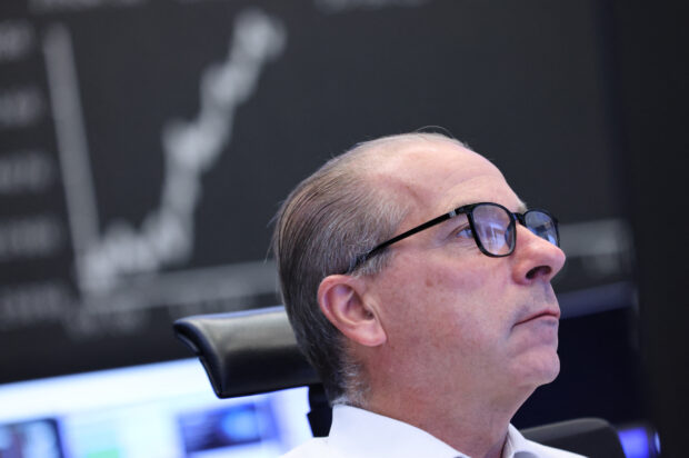 Global equity markets cautious before US inflation report