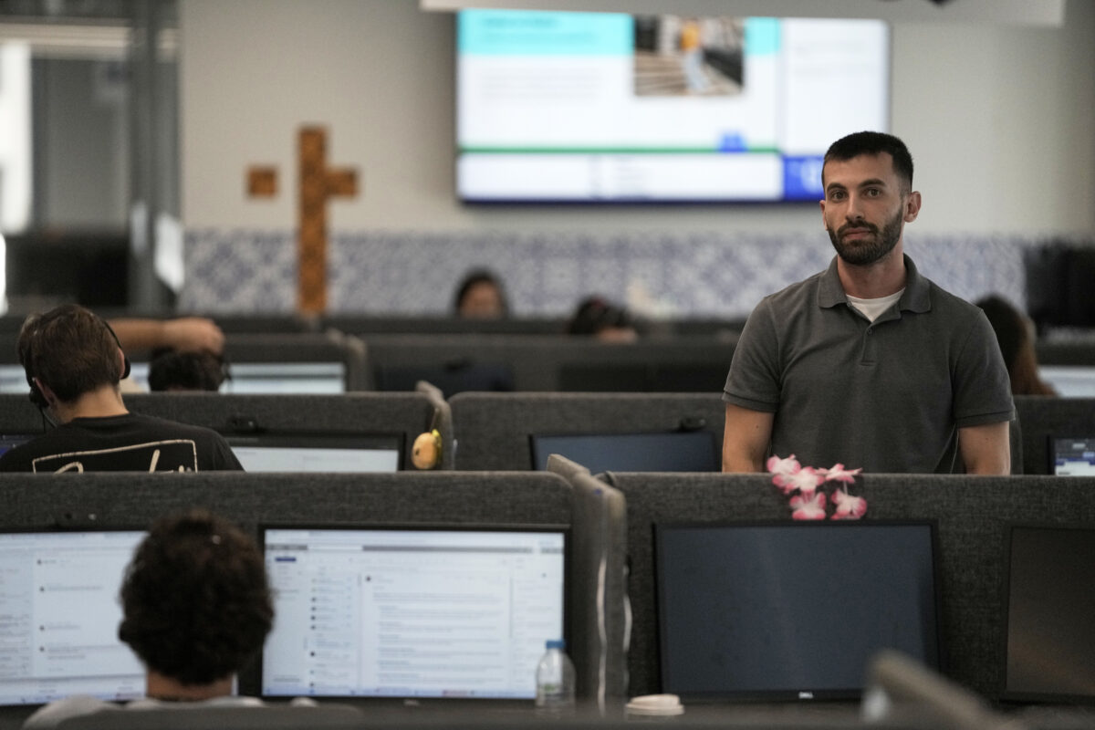 Armen Kirakosian, Global Senior Manager, Learning & Development TTEC poses in Athens, Greece (AP Photo/Thanassis Stavrakis)