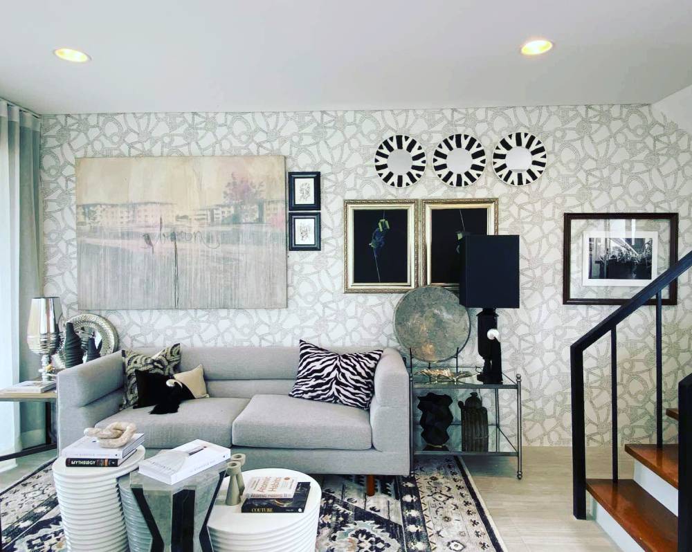 Black and white living room interiors—playing with paintings, posters and matting with frames